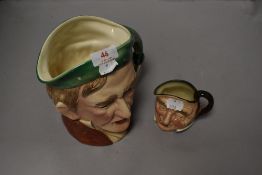A Beswick Pottery 'Scrooge' character jug, number 372, together with a Royal Doulton 'Farmer John'