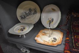 Four 20th century dog themed plates including Spodes Royal Jasmine and Burgess ware