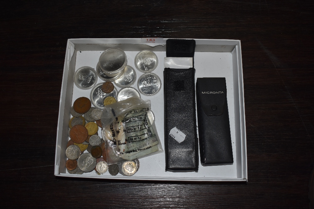 A selection of collectable coins and currency also a Micronta microscope and a Diamond Selector