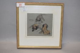 A small 20th century study sketch, three puppies, initialled and dated (obscured by mount) framed