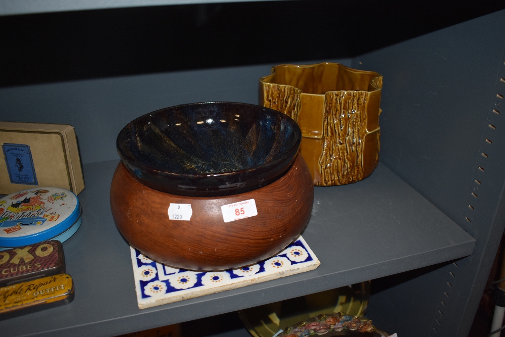 A mid century teak carved wooden bowl and similar including Woods planter
