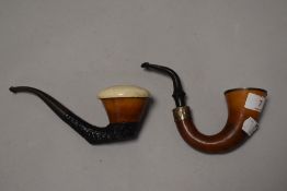 A pair of German style calabash tobacco smokers pipes one having HM silver collar and bowl