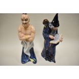 Two Royal Doulton Figures The Genie HN2989 and the Wizard HN2877.