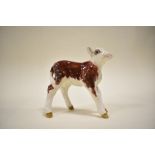 A Beswick study, Hereford calf 1406B, brown and white gloss.