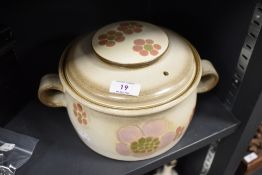 A 1970s Denby tureen, having floral pattern to cream and beige ground.