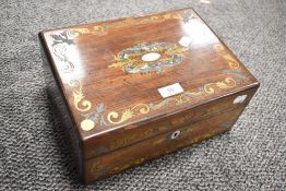 A 19th century mahogany box inlaid with brass and paua shell, having MOP escutcheon and central