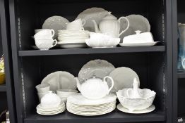 A part Coalport 'Countryware' dinner service comprising teapots, plates,butter dish, servers etc.