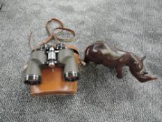 A pair of 10x50 Extra Wide Angle Greehkat Binoculars in case along with a wooden model of a