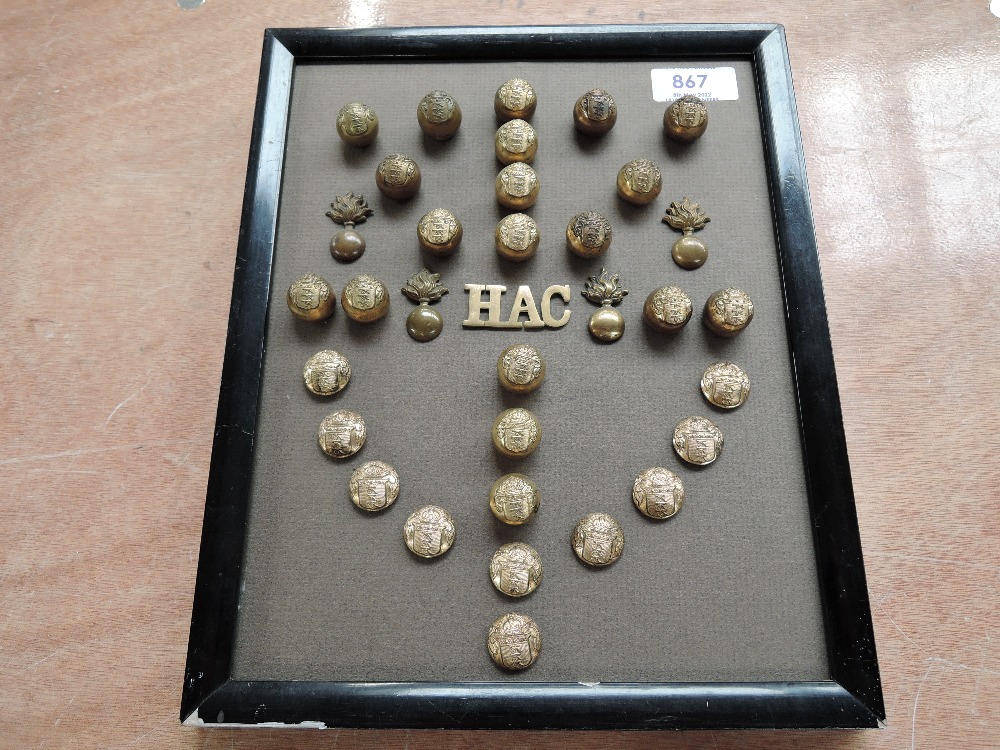 A framed display of Buttons for the Honourable Artillery Company includes flat buttons (9) and