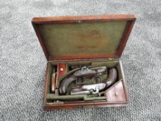 A cased set of two small Percussion Pistol's possibly Pocket or Muff Pistol's, by Smith London,