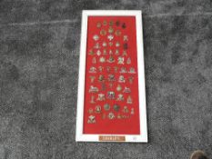 A framed display of Military Cap Badges for the Cavalry including First Life Guards, Blues and