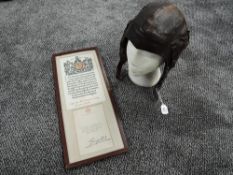 A leather Flying Helmet along with a framed WWI Scroll to Capt.John Nicol Ferguson Pixley