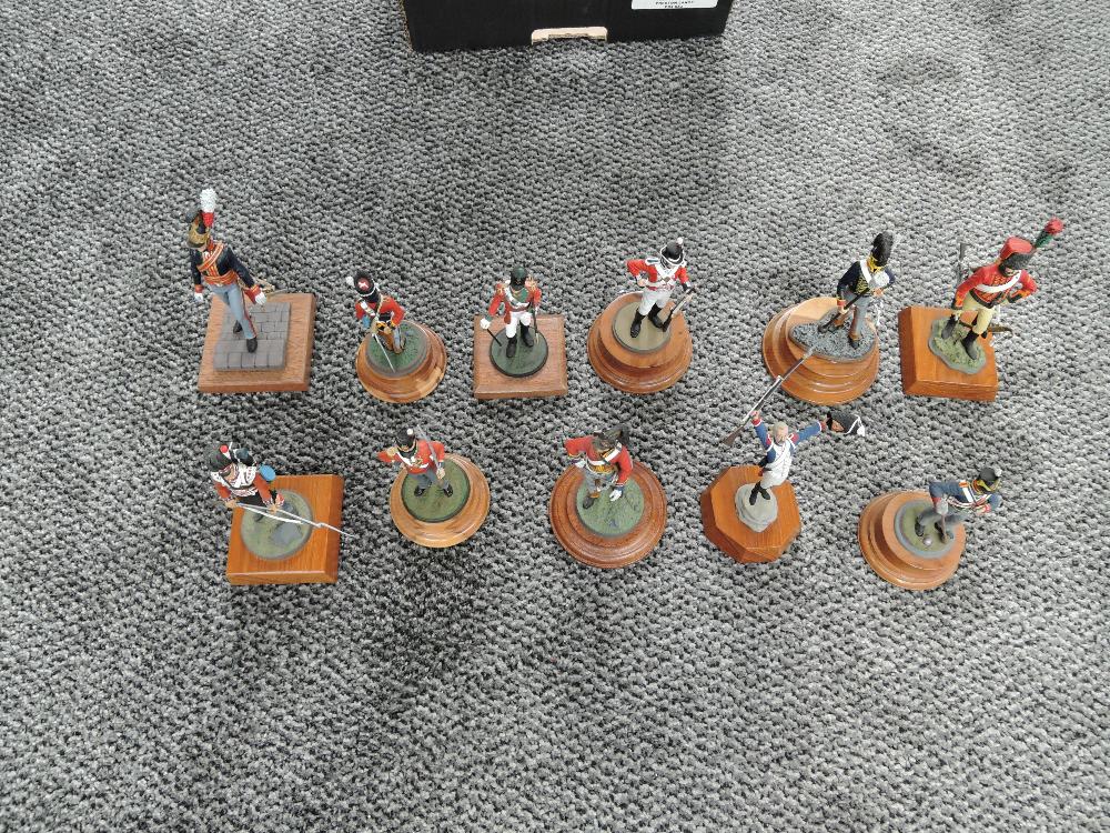 Eleven hand painted Napoleonic Military Figures approx 13cm height on wood bases, mainly English,