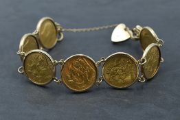 A seven sovereign bracelet having coins dated 1904/06/08/10 in removable 9ct gold mounts with