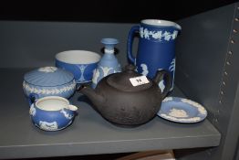 A selection of Jasperware by Wedgwood including basalt teapot and blue ground jug