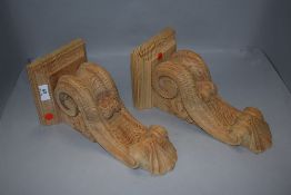 A pair of modern pine wood hand carved corbels or wall sconce