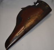 An unusual 20th century leather and brass arrow quiver possibly continental, of solid construction