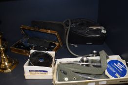 A selection of early 20th century medical or doctors devices including stethoscope