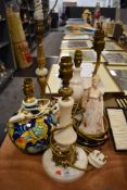 Five bed side or table lamps including Majolica style, figural and stone cut