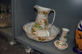 A stunning wash jug and bowl set by Phoenix ware having a chintz style design with Chinoiserie