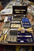 A selection of cased cutlery and flatware including mother of pearl handled serving set