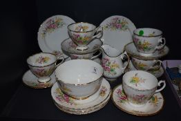 A porcelain part tea service by Staffordshire bone china in a floral print