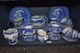 A selection of various makes of blue and white ware pottery including Spode and Ironstone