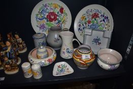 A selection of vintage mid century pottery by Poole in various designs