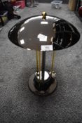 A modernist art deco design side or table lamp with tripod supports