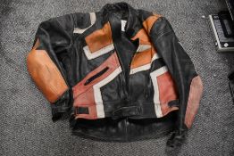 A vintage motor cycle read white and black leather jacket by J&S