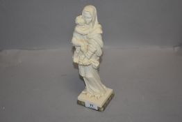 A modern figurine of mother and child in a Roman design having onyx base