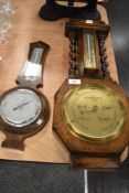 Two early 20th century barometers including mercury filled oak cased