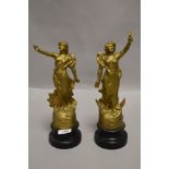 A pair of French spelter mantle garniture figures night and day