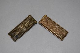 Two late Victorian brass needle cases by Perry and Co having tooled detailing