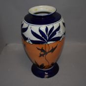 A late Victorian arts and crafts style vase for Bursley ware attributed to early Charlotte Rhead