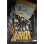 A selection of cutlery and table wares including butter knives
