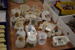 A selection of vintage tourist keepsake crested ware including Carlton and Coronet