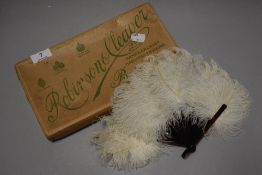 A late Victorian Ostrich feather fold out fan having tortoise shell branches and original box