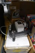 A Plus O Matic D Deluxe film projector and a similar slide viewer by Colorslide