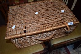 A wicker picnic basket