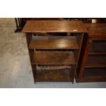 An early 20th Century oak low bookshelf