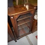 A 19th Century walnut music sheet music cabinet having glass front