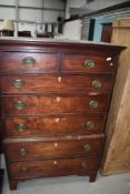 A Victorian tall boy chest of two over five drawers having beaded frontage with original handles