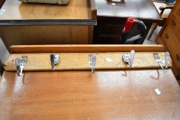 A hand made kitchen hook rack made from cutlery