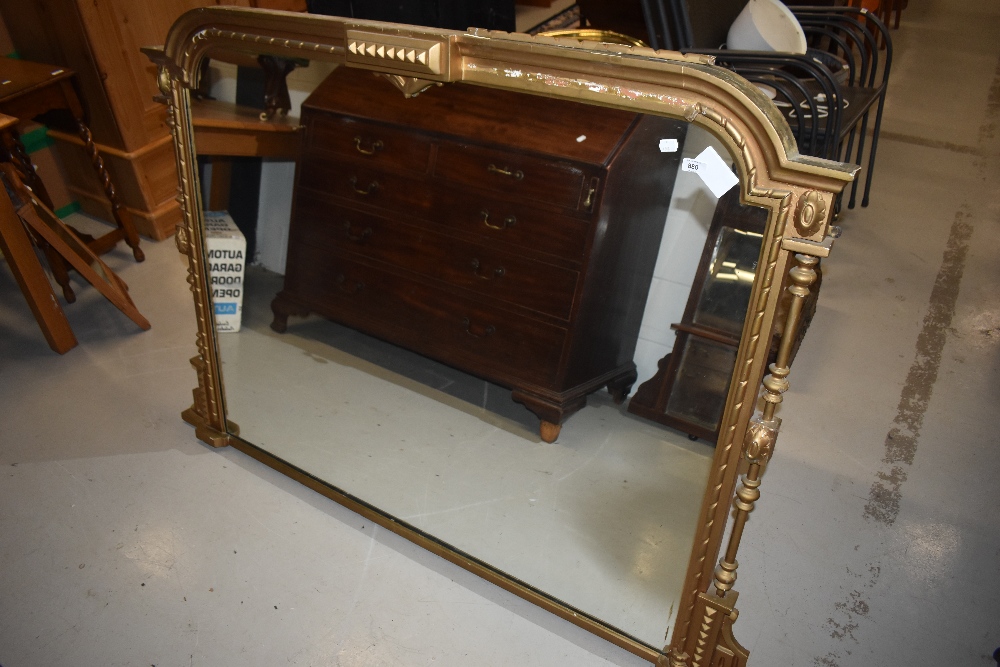 An antique gilt framed over mantel mirror, width approx. 142cm