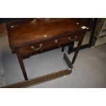 A Victorian mahogany fold over tea table