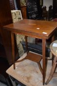 An Edwardian mahogany and inlaid fold over tea or work table