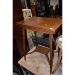 An Edwardian mahogany and inlaid fold over tea or work table