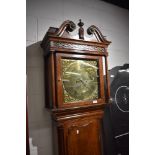 An 18th Century and later oak long case clock having 8 day movement and brass dial , named Fearnly ,