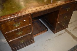 A late 19th or early 20th Century oak partners desk, approx. 150 x 105cm